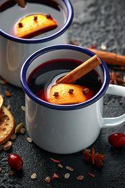 mulled-wine-white-rustic-mugs-spices-orange-fruit_cg2p71728355c_th